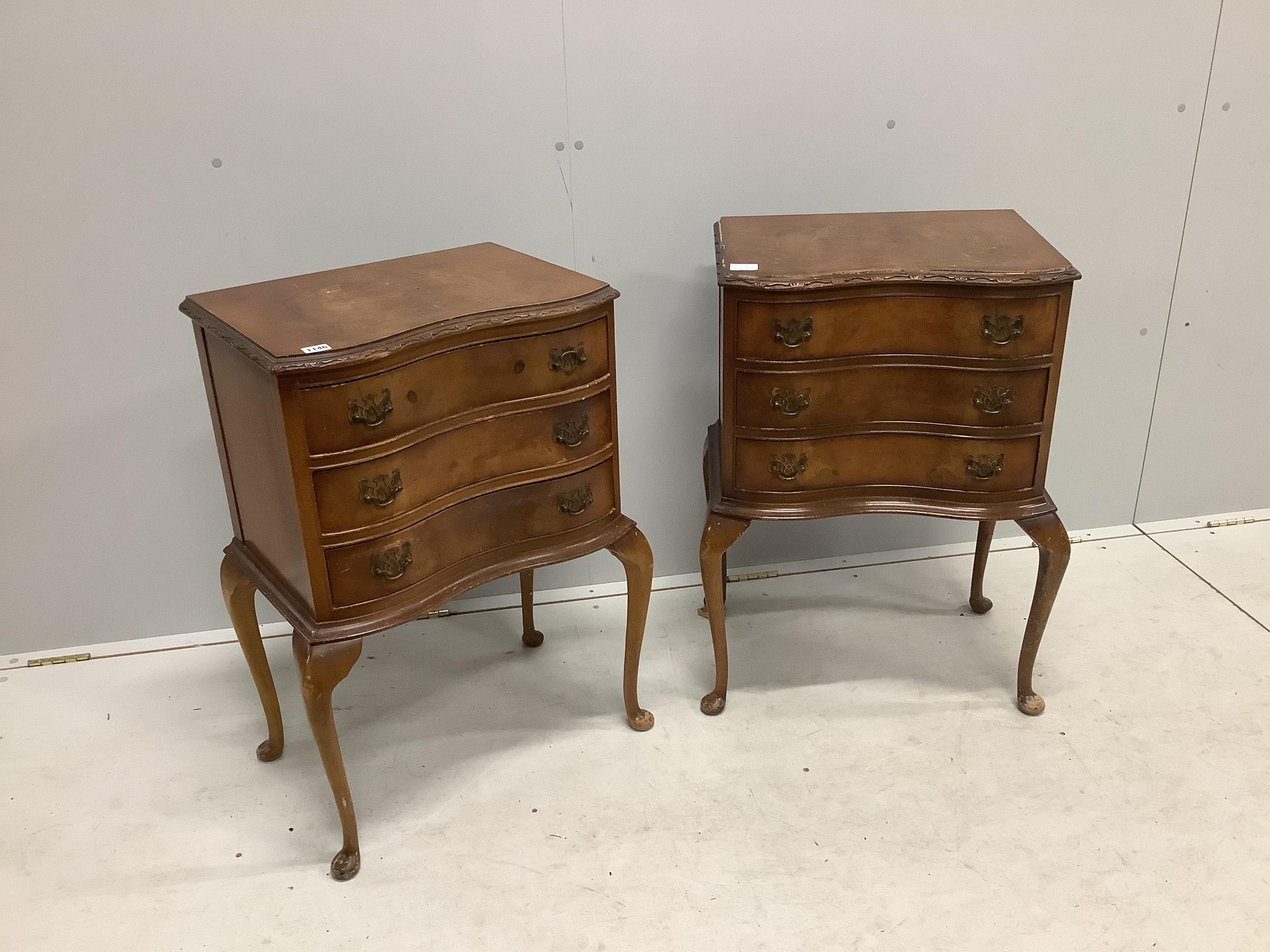 A pair of Queen Anne Revival serpentine walnut three drawer bedside chests, width 51cm, depth 35cm, height 77cm. Condition - poor to fair